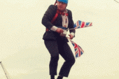 PHOTOS: Mayor of London Gets Stuck On Zip Line Waving Tiny British Flags